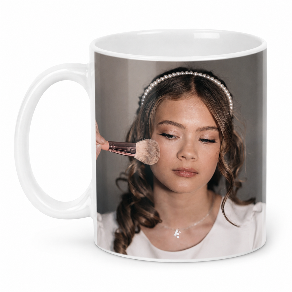 A white ceramic mug featuring a printed a photograph 