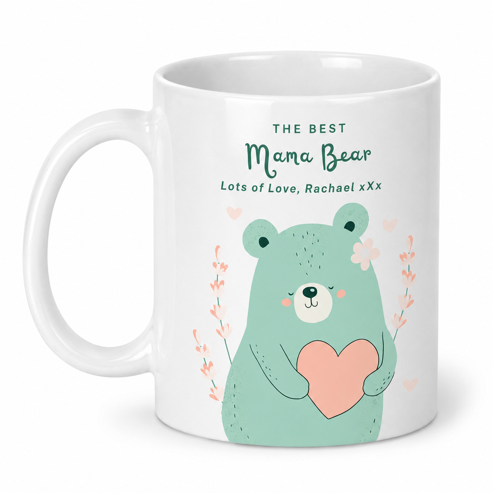 A white ceramic mug featuring a cute illustration of a mint green bear holding a pink heart, with the text 'THE BEST Mama Bear Lots of Love, personalised with any name. Gift for mum mother's day / birthday / christmas mug

