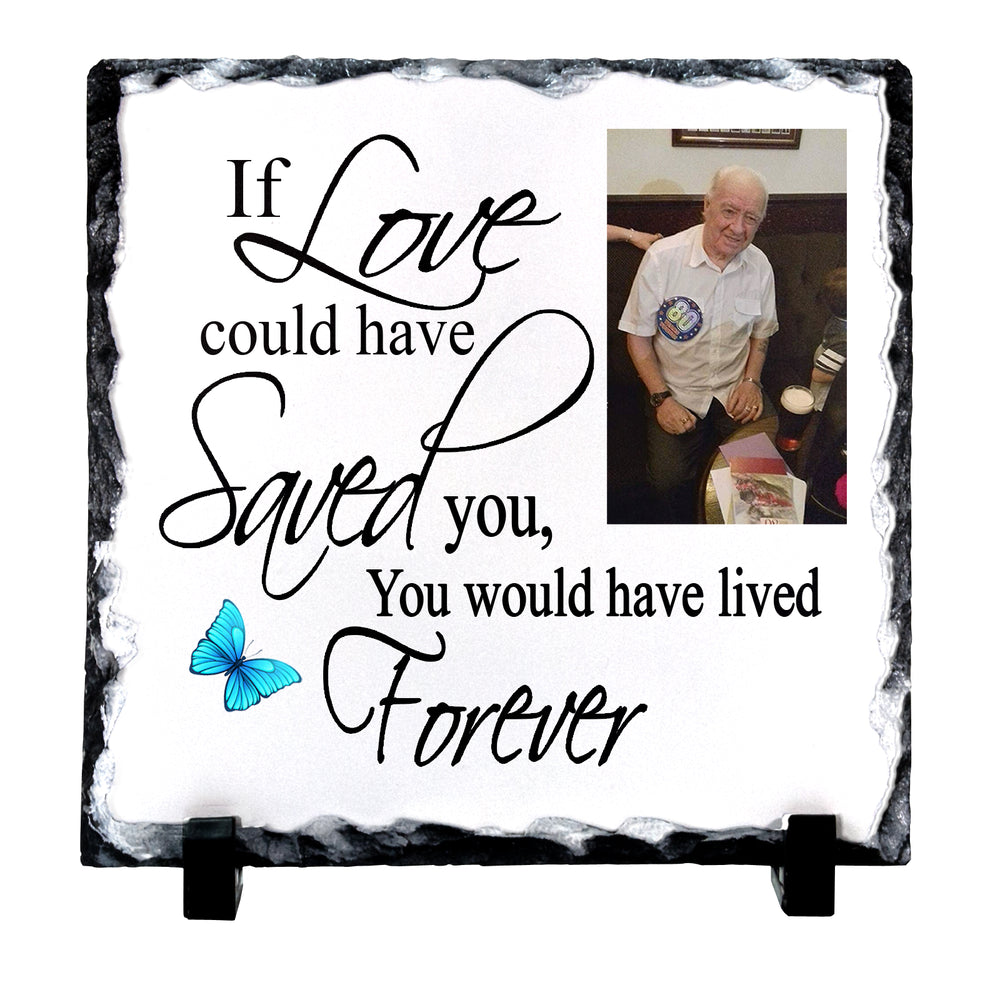 Personaliseed slate memorial plaque with black text reading 'If Love could have Saved you, You would have lived Forever' and a small photo of a man, displayed on a black stand against a white background.