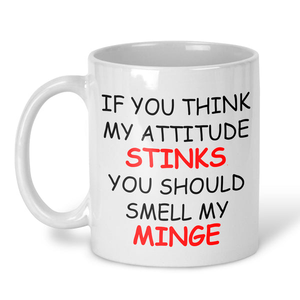 White ceramic mug with the humorous slogan 'If You Think My Attitude Stinks, You Should Smell My Minge' printed in black and red text on the front.